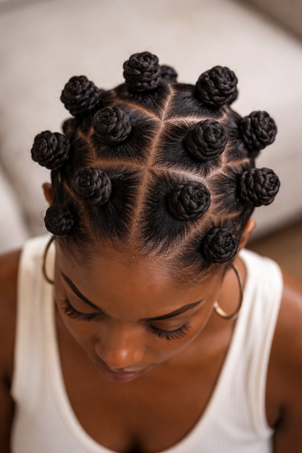 Top-down view of Bantu knots on a Black woman's head