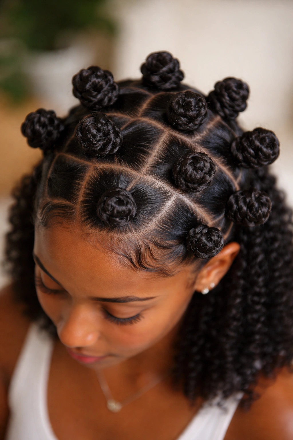 Top-down view of bantu knots arranged on scalp