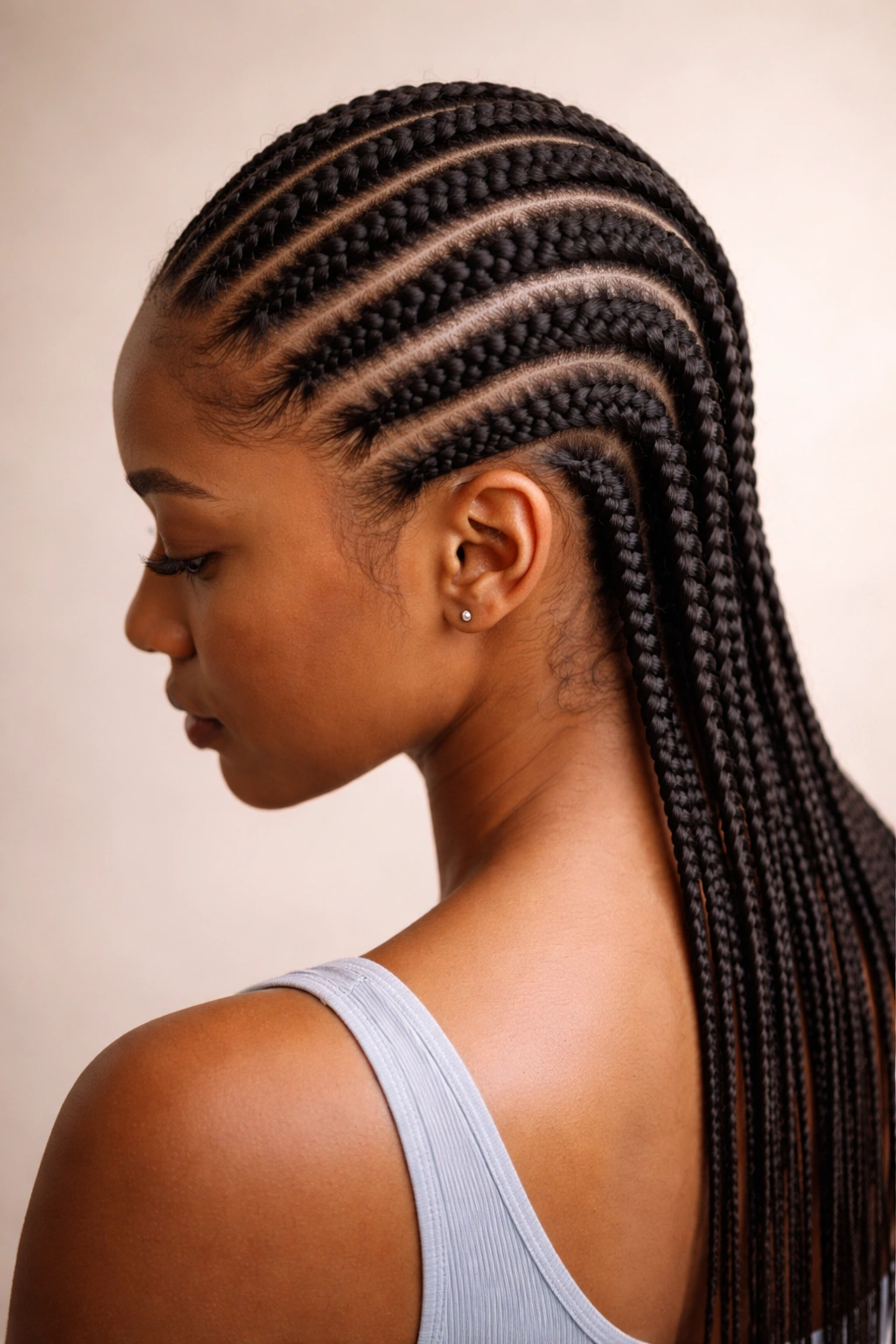 Close-up of straight-back cornrows along the scalp