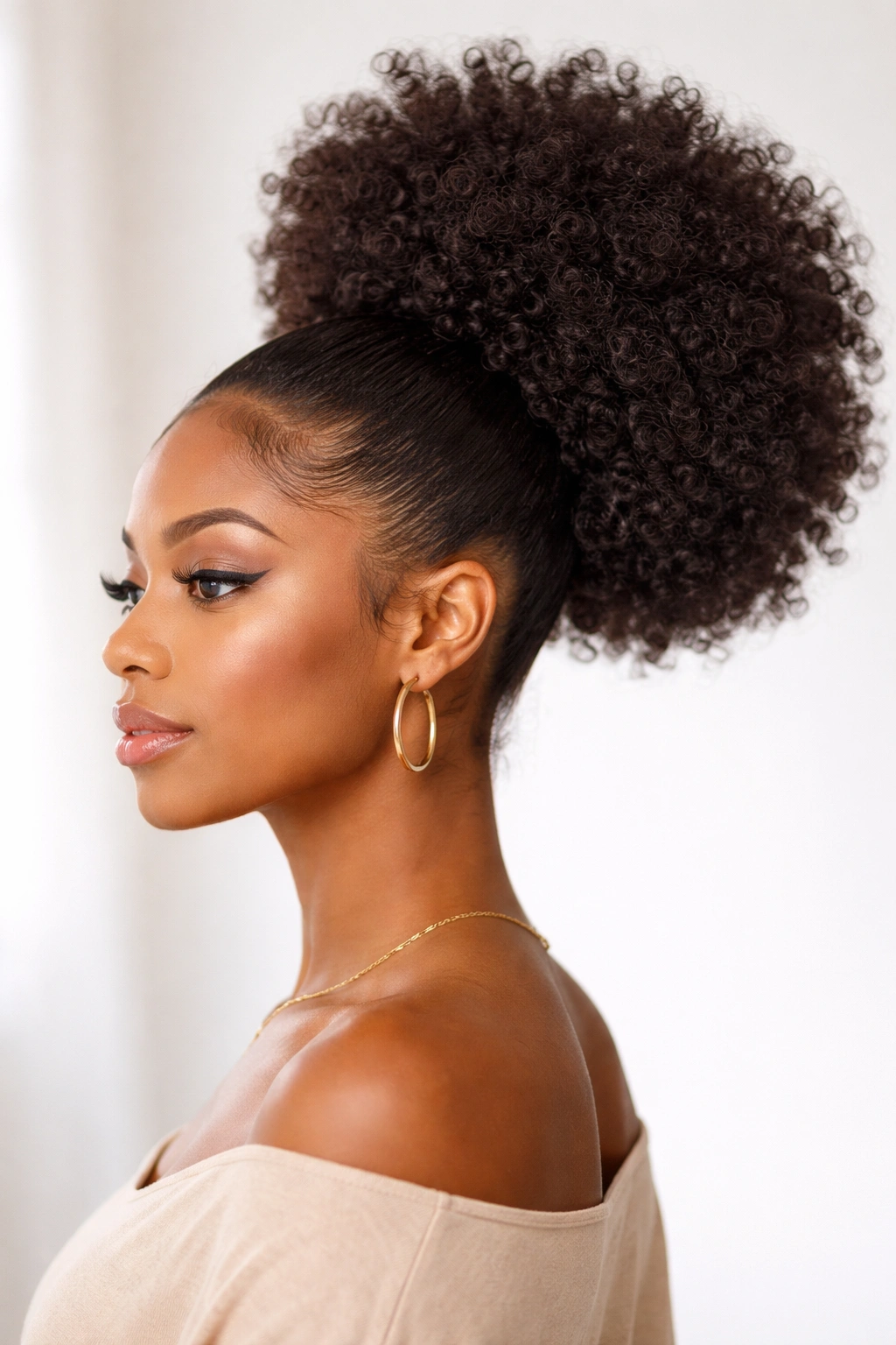 Voluminous puffball ponytail with round crown