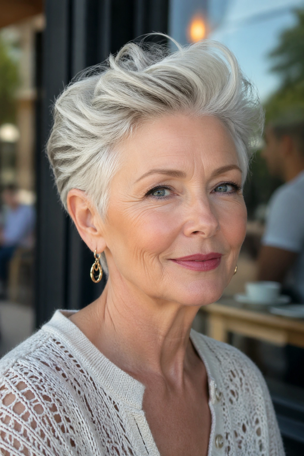 Close-up of airy pixie with swept-back top in natural light