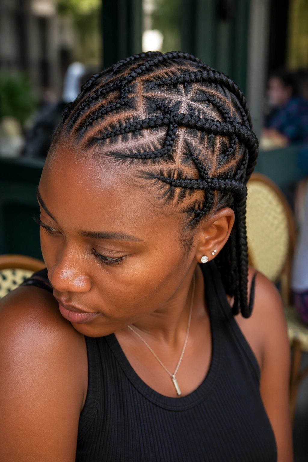 Close-up portrait of crisscross cornrows on a real person