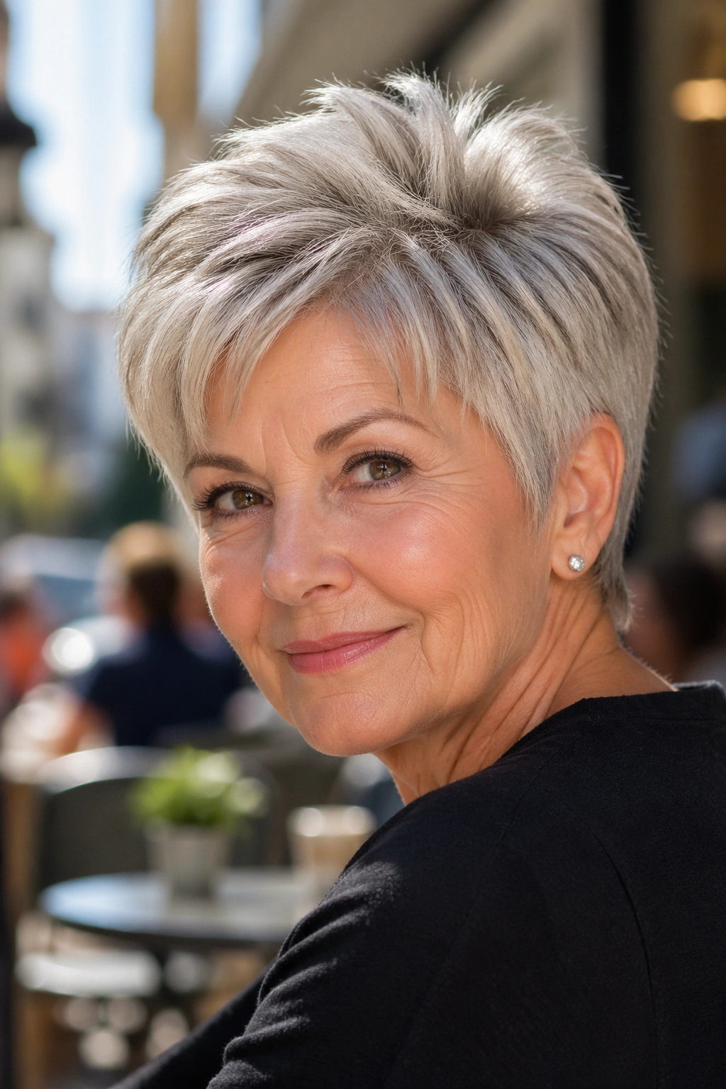 Older woman with feathered pixie hairstyle in natural light