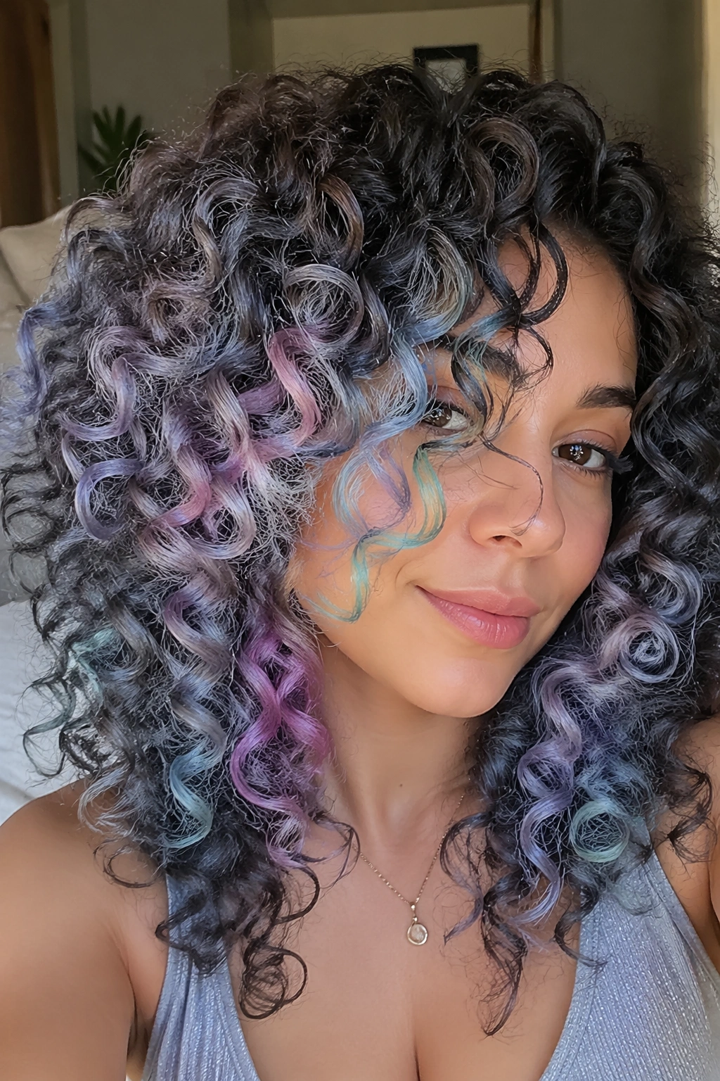 Portrait of a real person with curls showing hidden pastel colors.
