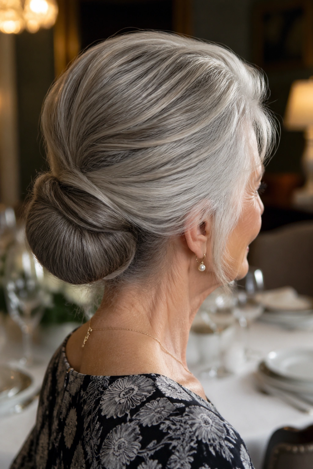 Back/side profile of real woman with low chignon and crown lift