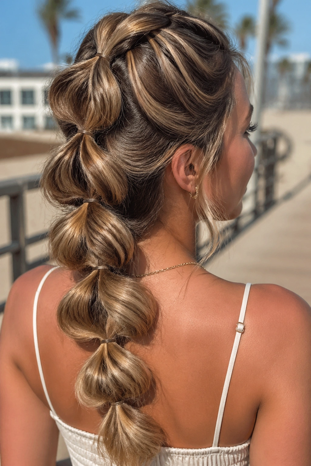 Close-up of pull-through mermaid braid with big links on real woman.