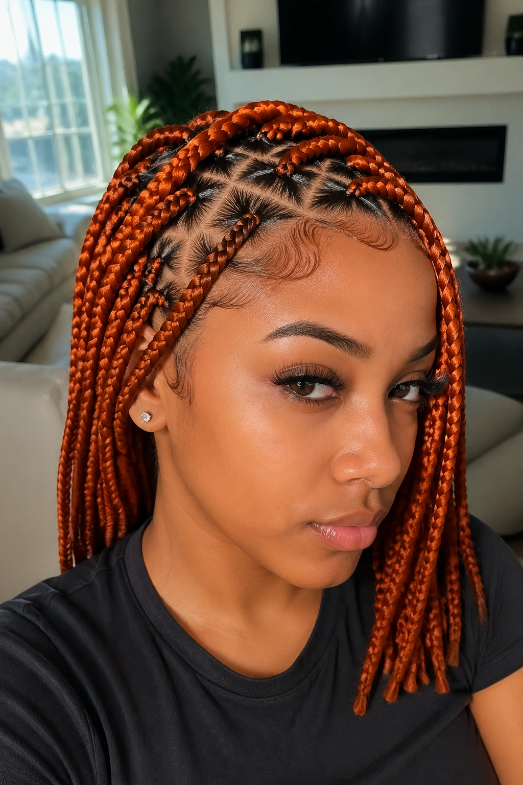 Real woman with triangle-part orange box braids