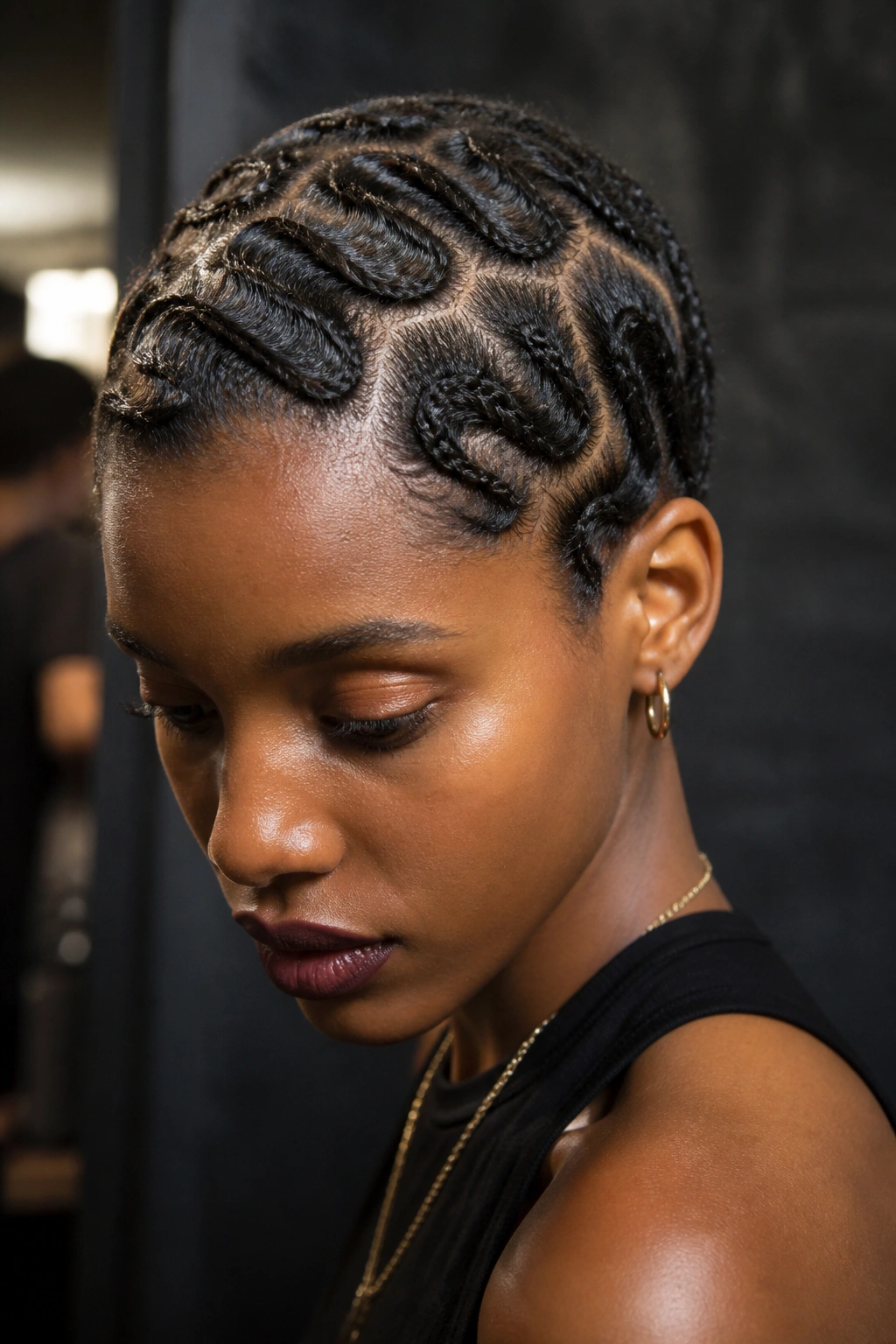 Close-up of finger wave braids on a short 4C hairstyle