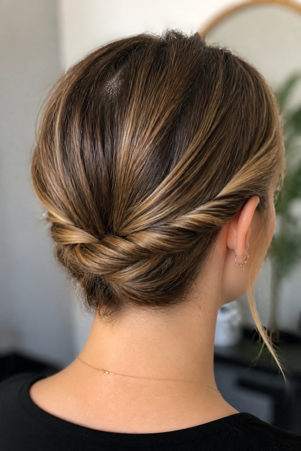 Close-up of a real woman with a rope twist hairstyle