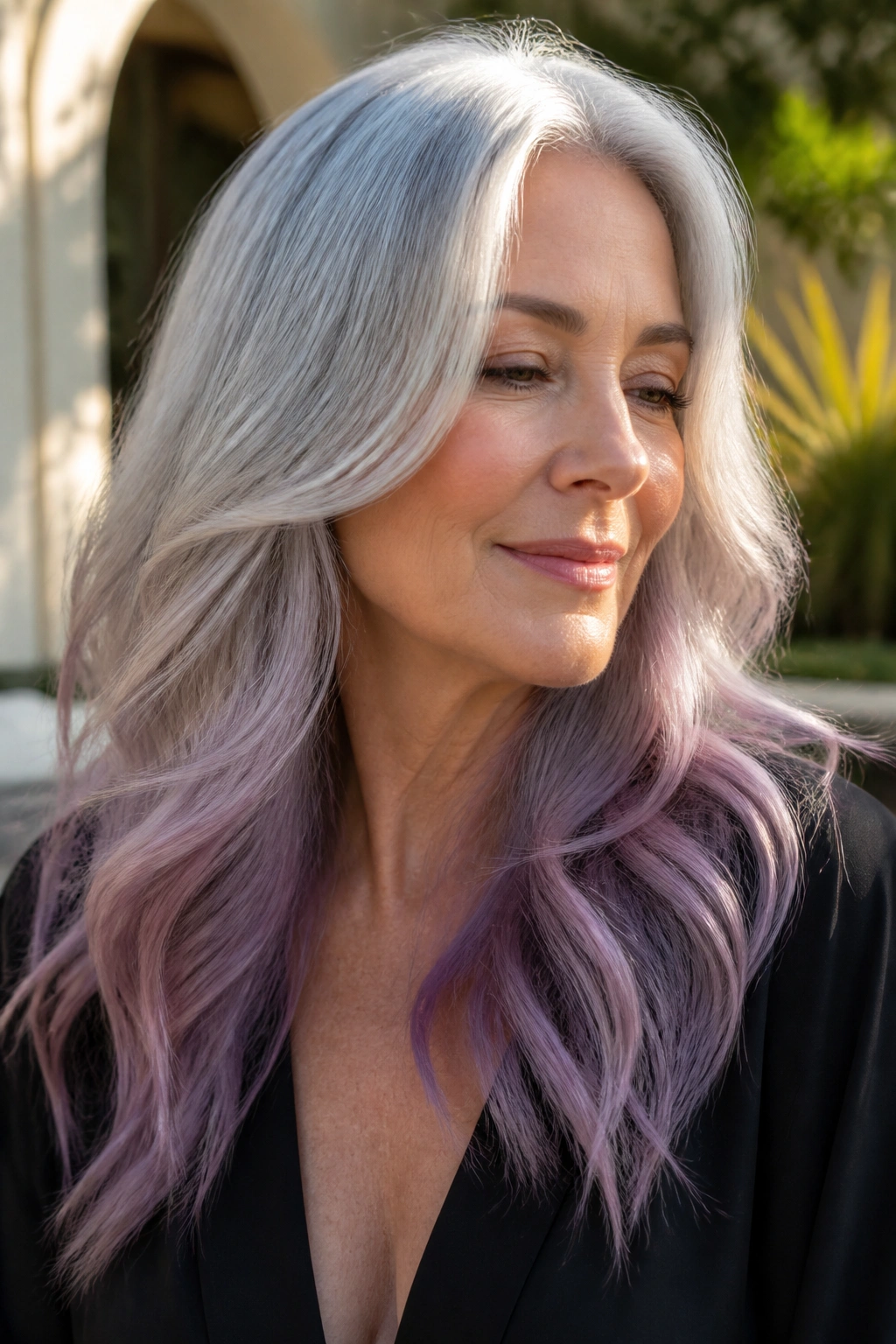 Hair gradient from silver to lilac in a close-up portrait
